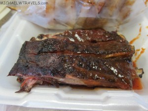 a piece of meat on a styrofoam container
