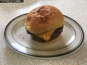 a cheeseburger on a plate