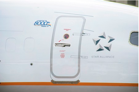 a close-up of a door on an airplane