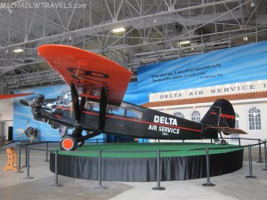 an airplane on display in a hangar