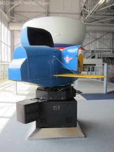 a blue and yellow airplane model
