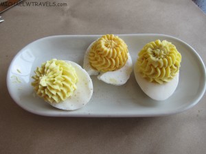 devil deviled eggs on a plate