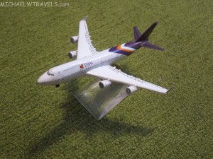 a model airplane on a green field