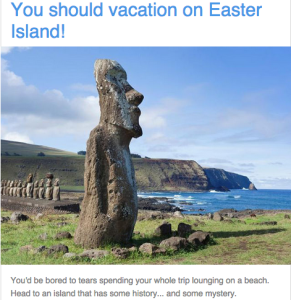 a group of stone statues on a grassy area with Easter Island in the background