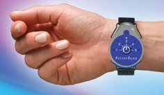 a hand holding a blue watch