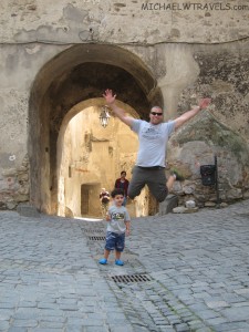 a man and child jumping in the air