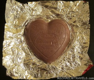 a chocolate heart on a foil