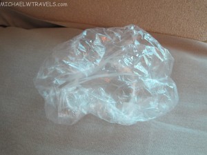 a plastic bag on a couch