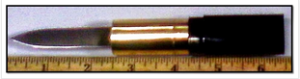 a ruler and a cylindrical object