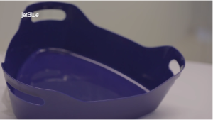 a blue pan with handles