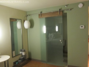 a sliding glass door in a bathroom