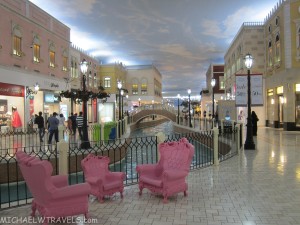 a pink chairs in a mall