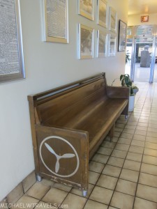 a wooden bench in a hallway