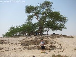 a child standing in the sand