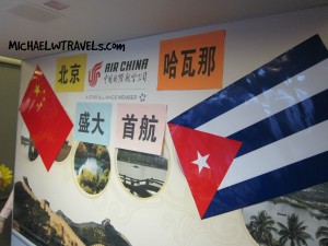 several different flags on a wall