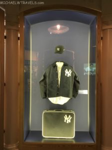 a jacket and hat in a case