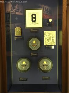 a display case with a number and images