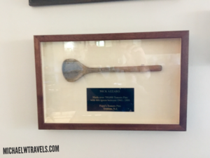 a wooden spoon in a frame