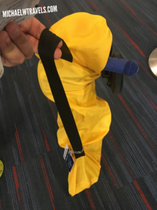 a person wearing a yellow suit