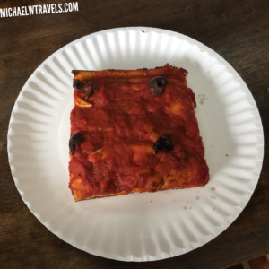 a piece of food on a paper plate