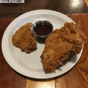 a plate of fried chicken and sauce