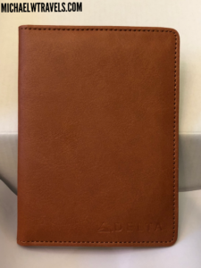 a brown leather cover on a white surface