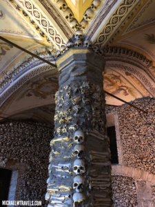 a column with skulls on it