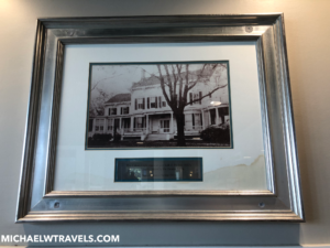a framed picture of a house