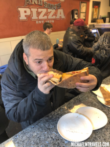 a man eating a sandwich