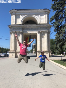 a man and boy jumping in the air