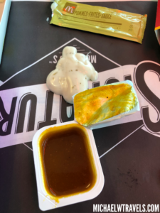 a sauce in a container on a table