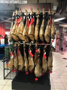 a rack of meat on hooks