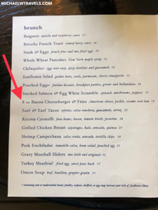 a menu with a red arrow