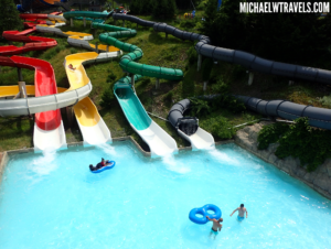 a water park with slides and people