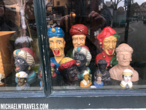 a group of statues in a window