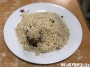a plate of rice on a table