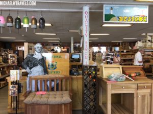 a store with a statue of a man