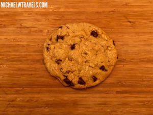 a cookie on a wooden surface
