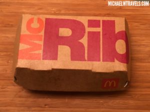 a fast food box on a wood surface