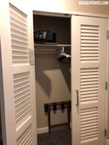 a closet with a door open