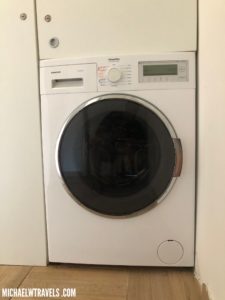 a white washing machine in a room