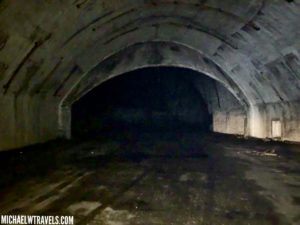 a tunnel with a dark tunnel