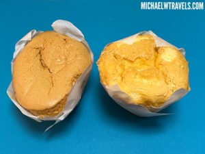 a couple of muffins on a blue surface
