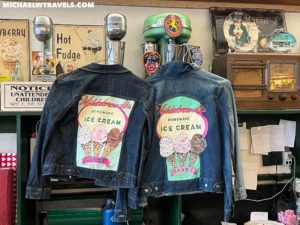 a pair of denim jackets with ice cream on them