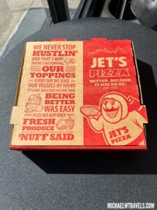 a red and white pizza box