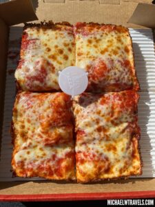 a box of pizza in a cardboard box