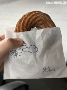 a hand holding a pastry