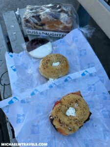 bagels on a plastic wrapper next to a bagel