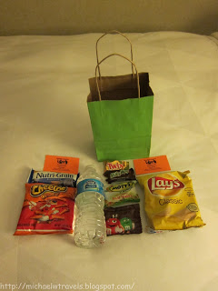 a bag of snacks and water