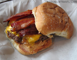 a cheeseburger with bacon and cheese